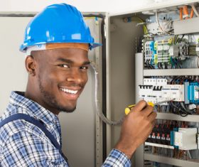Electrician technician repairing the electric brake Stock Photo 01