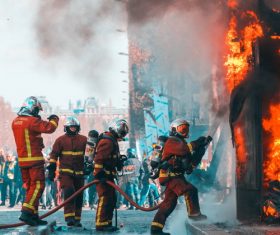 Firefighter firefighting scene Stock Photo
