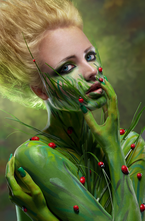 Human body green painting Stock Photo