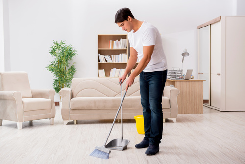 Man doing housework cleaning Stock Photo 01