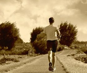 Man jogging outdoors Stock Photo
