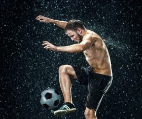 Man juggle in the rain Stock Photo 01
