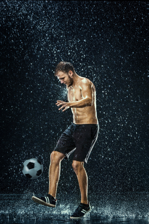 Man juggle in the rain Stock Photo 02