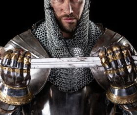 Medieval knight wearing armor Stock Photo 03