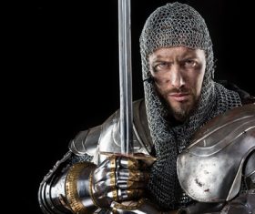 Medieval knight wearing armor Stock Photo 09