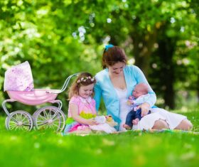 Mother with children in the park Stock Photo 01
