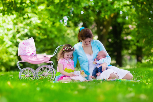 Mother with children in the park Stock Photo 01