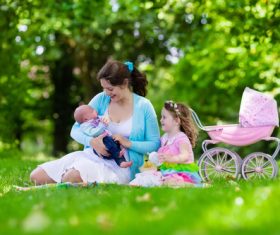 Mother with children in the park Stock Photo 02