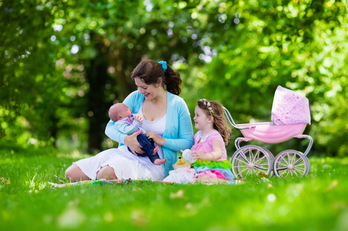 Mother with children in the park Stock Photo 02