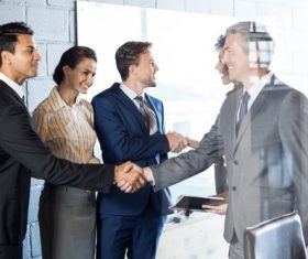 Negotiate a successful handshake Stock Photo 01