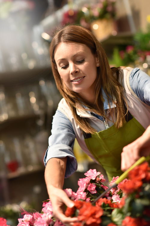 Operating flower shop woman Stock Photo 03