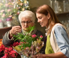 Operating flower shop woman Stock Photo 07