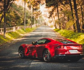 Red Ferraricar cars parked on the road Stock Photo