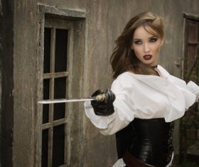 Role player Female pirate wielding a sword Stock Photo 02