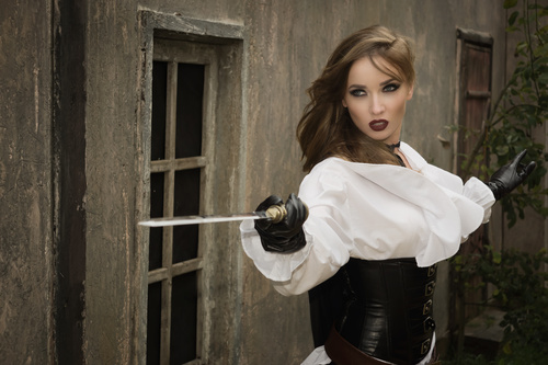 Role player Female pirate wielding a sword Stock Photo 02