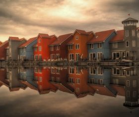 Sea houses reflected in sea Stock Photo