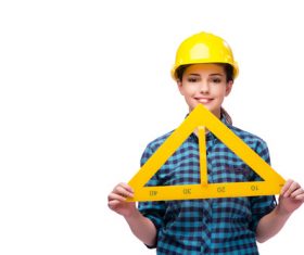 Wearing overalls woman holding a triangle ruler Stock Photo
