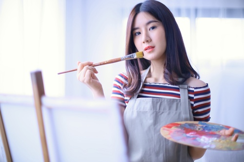 Woman painting oil painting Stock Photo