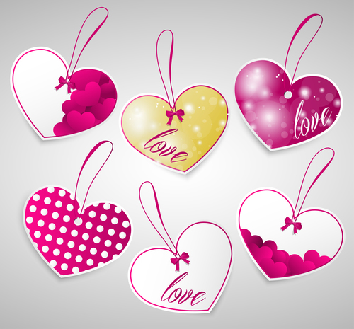 Different color heart shaped label design vector